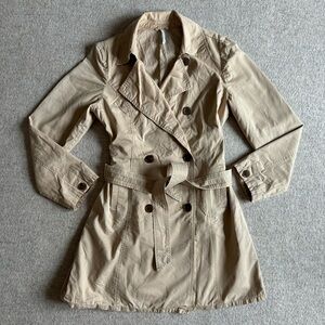 Tan and cream trench coat with belt